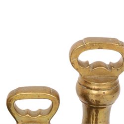 Graduating set of brass bell weights