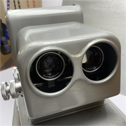 West German 3-D slide projector with dual CassarP Steinheit Munchen 1:2.8/80mm lens W39cm H28cm, in oak carrying case; together with Bell & Howell projection screen on folding stand, silvered reflection board and quantity of 3-D glasses etc