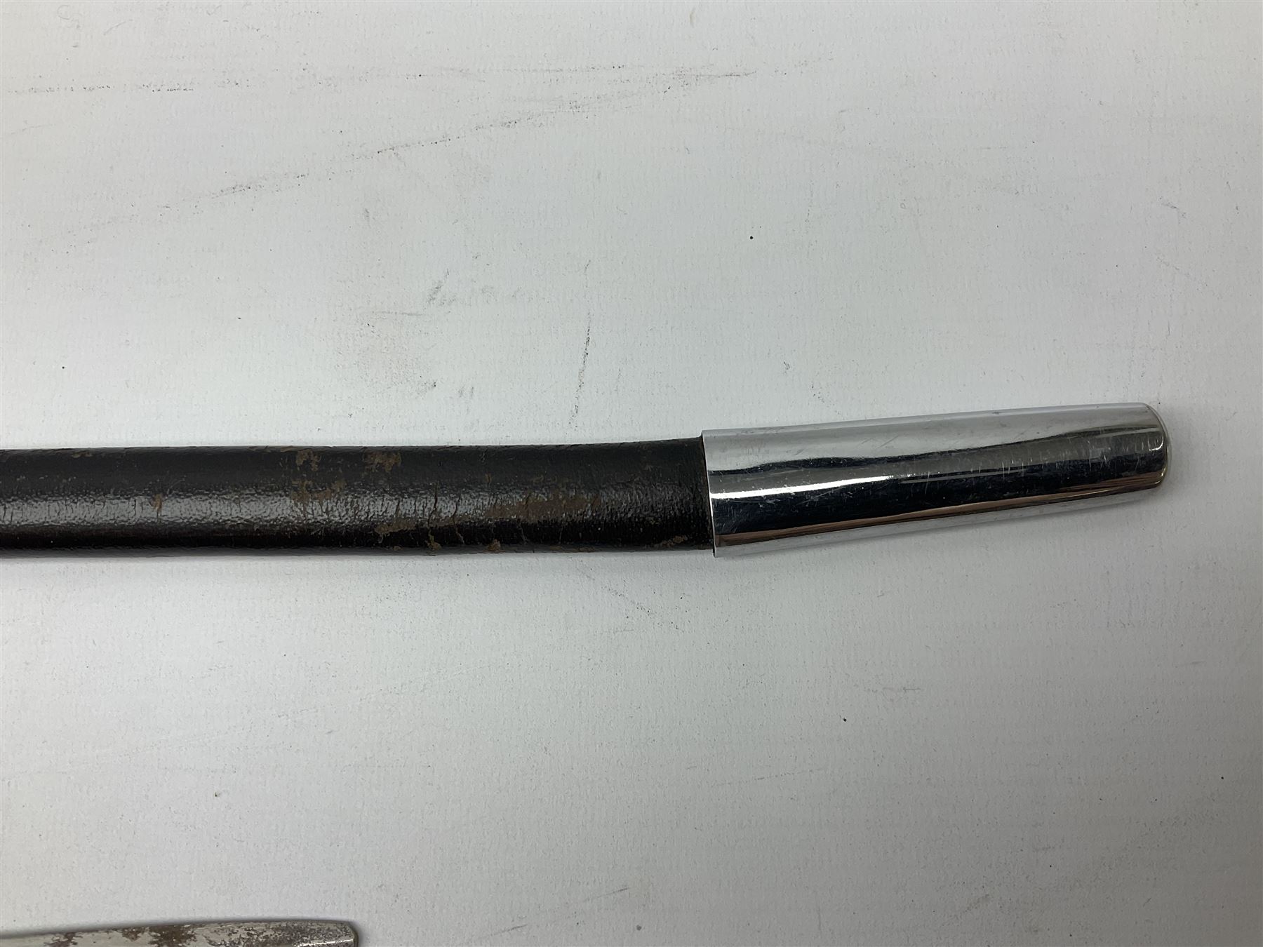 Replica knight's longsword, the 91.5cm double-edged steel blade with basket hilt and wire-bound bone grip with spherical pommel, in leather scabbard L112cm overall