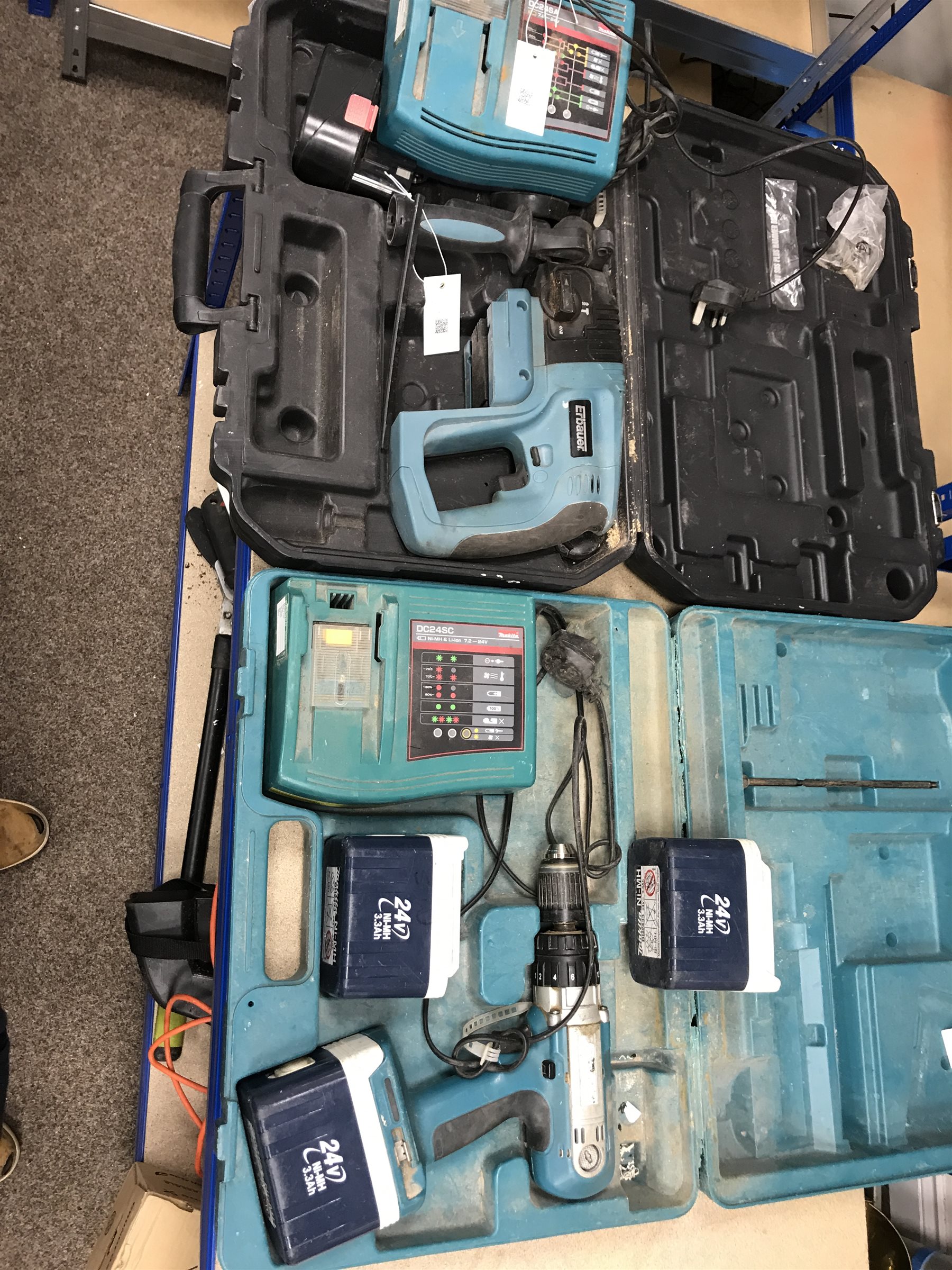 A quantity of hand tools including a Ferm FAG-230 angle grinder, a MacAllister reciprocating saw, a jig saw etc