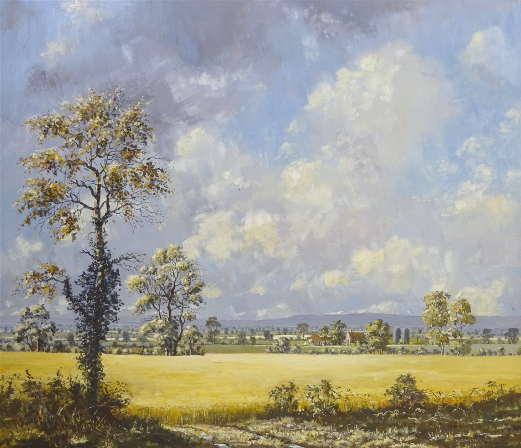 John H Capstick (British 20th century): 'Ryedale Scene', acrylic on board signed, titled and dated 1988 verso 59cm x 69cm