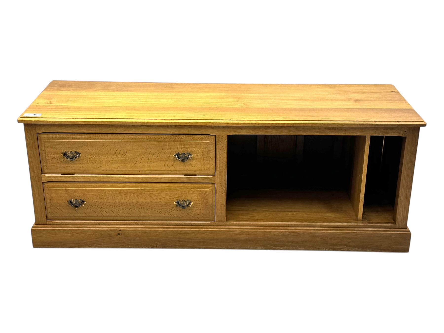Contemporary oak television media cabinet, rectangular top with moulded edge, fitted with two long drawers beside two open compartments, on plinth base