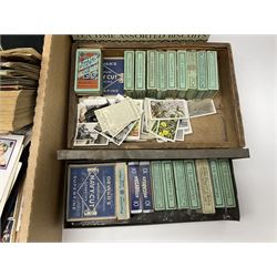 Great British and World stamps, trade cards, ephemera and miscellaneous items, including small number of Queen Elizabeth II mint decimal stamps, Antigua, Ascension, Australia, Australia, Barbados, Basutoland, British Honduras, Canada, Great Britain King George V used seahorses etc, in one box