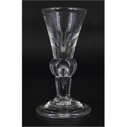 Early 18th century toastmasters glass, the deceptive funnel bowl upon a knopped stem with elongated tear and folded conical foot, H11cm
