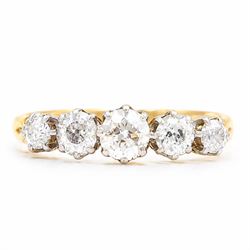 Gold diamond ring, set with five graduating old cut diamonds, stamped 18ct, total diamond ...