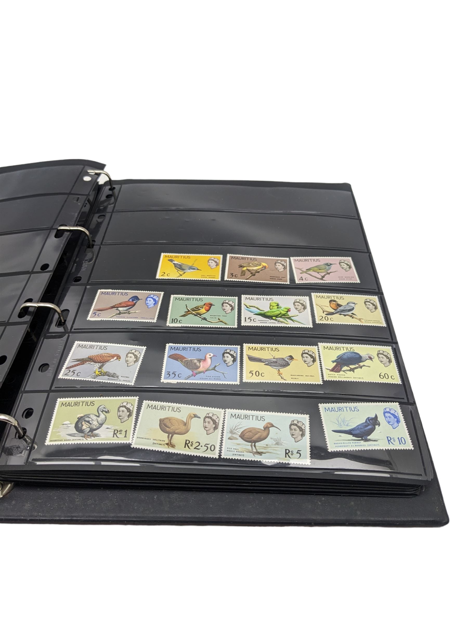 Mostly King George VI and Queen Elizabeth II Commonwealth or Empire stamps, including QEII British Solomon Islands, Pitcairn Islands, Seychelles, Sierra Leone, Mauritius, Guernsey etc, KGVI Turks and Caicos Islands, Falkland Islands Dependencies etc, mixture of mint and used values with some higher values