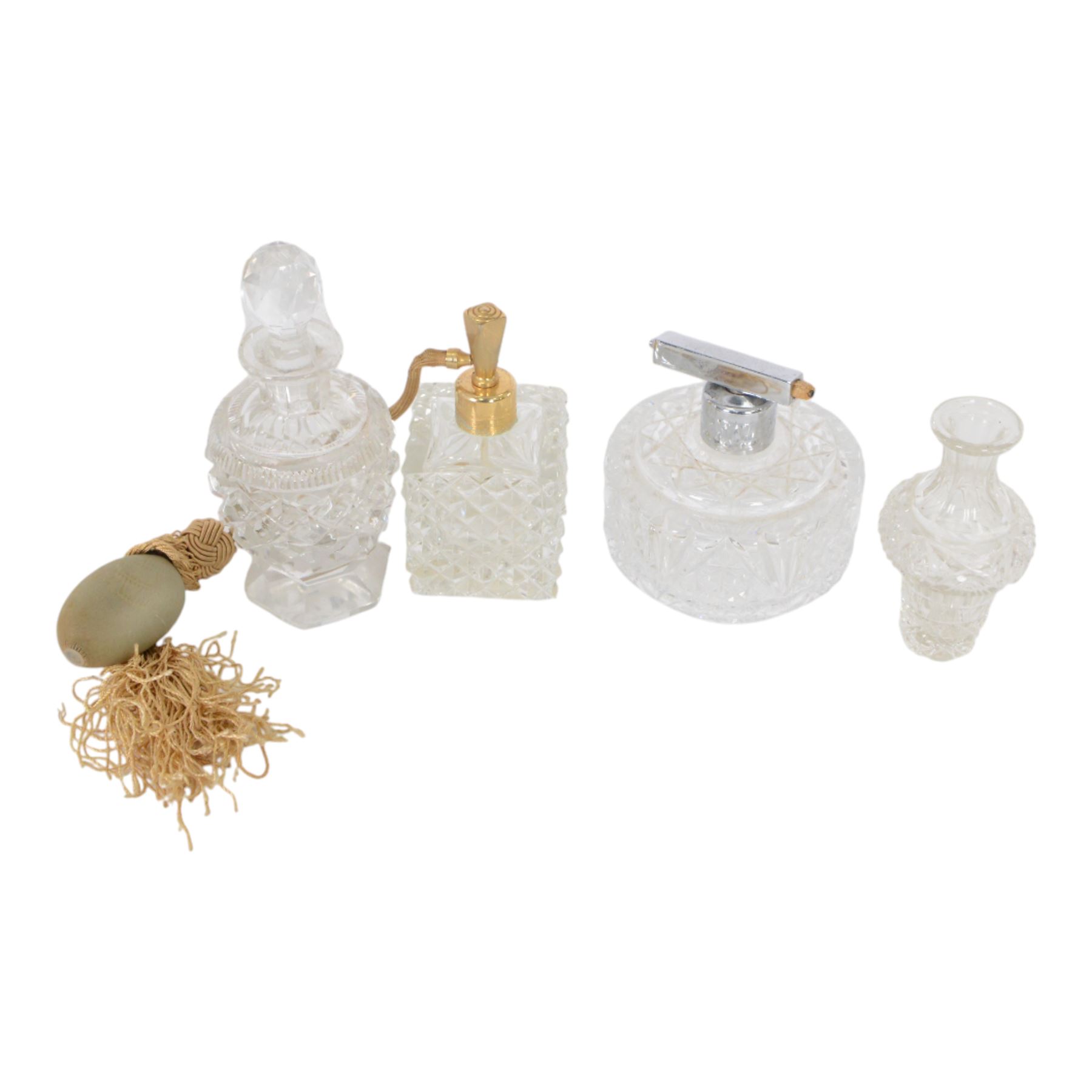 Collection of cut glass scent bottles including Art Deco examples and a cut glass tray