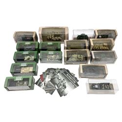 Sixteen Atlas Editions die-cast models of military vehicles including six Ultimate Tank Collection; all in perspex display cases; fourteen boxed; with associated paperwork (16)