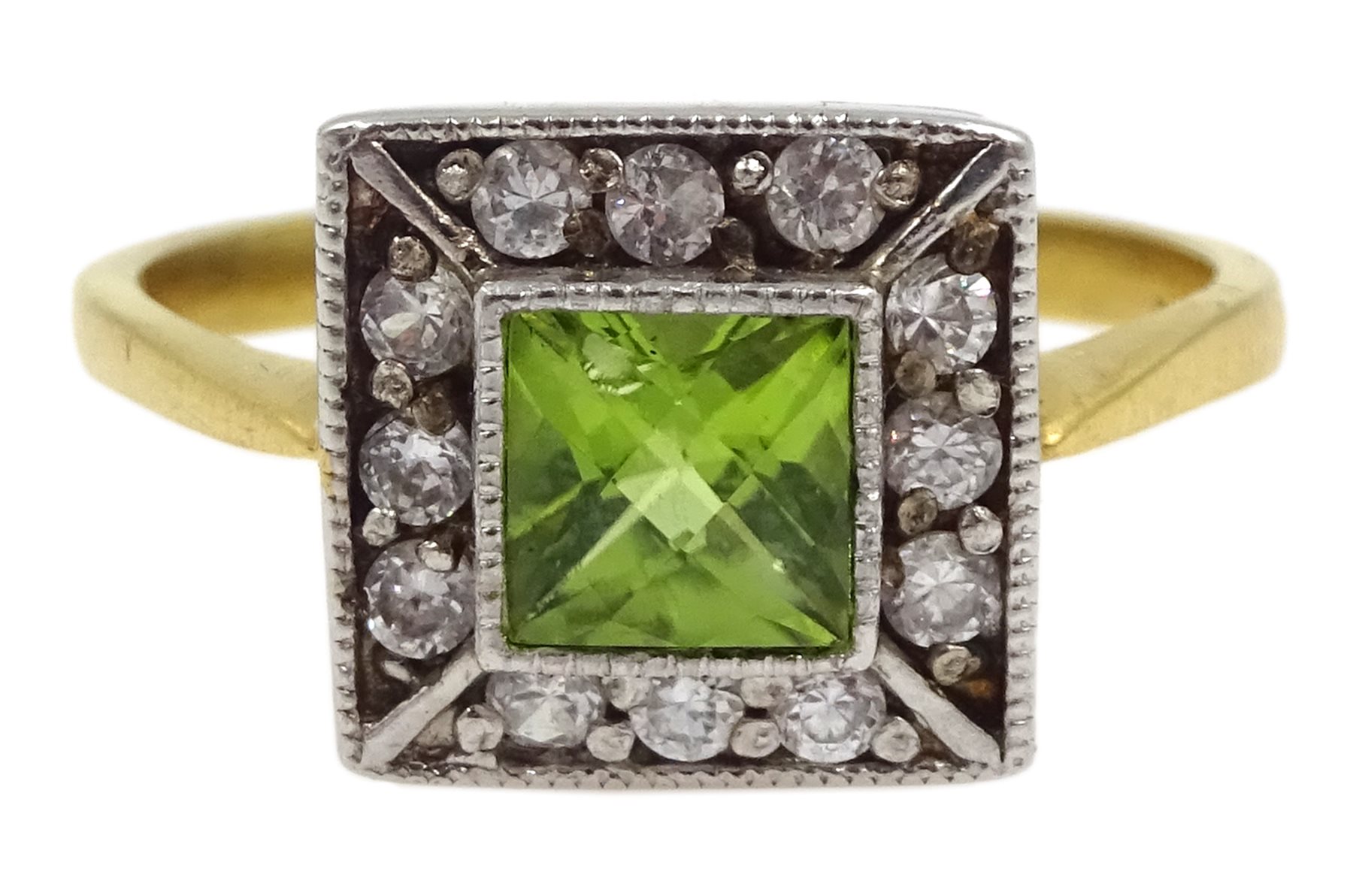 Silver-gilt peridot and cubic zirconia ring, stamped sil
