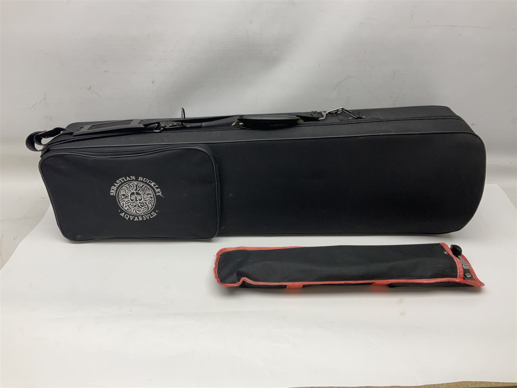 Sebastian Bucklet Aquae Sulis copper and brass trombone No.0910004; in lightweight carrying case; and Kinsman folding tubular chrome music stand in case (2)