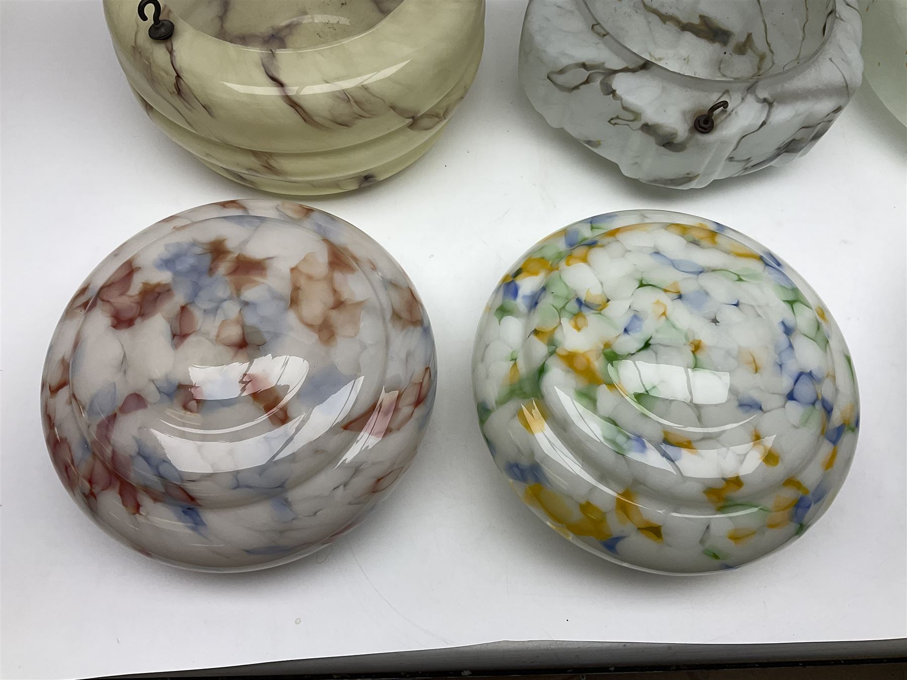 Six Art Deco glass fly catcher light shades, including marbled, mottled and frosted glass examples, largest D31cm