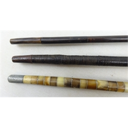  Early 20th century walking stick with sectional inlaid horn shaft and handle, another similar sectional horn walking stick and a leather bound example with carved horn hoof handle, L88cm   