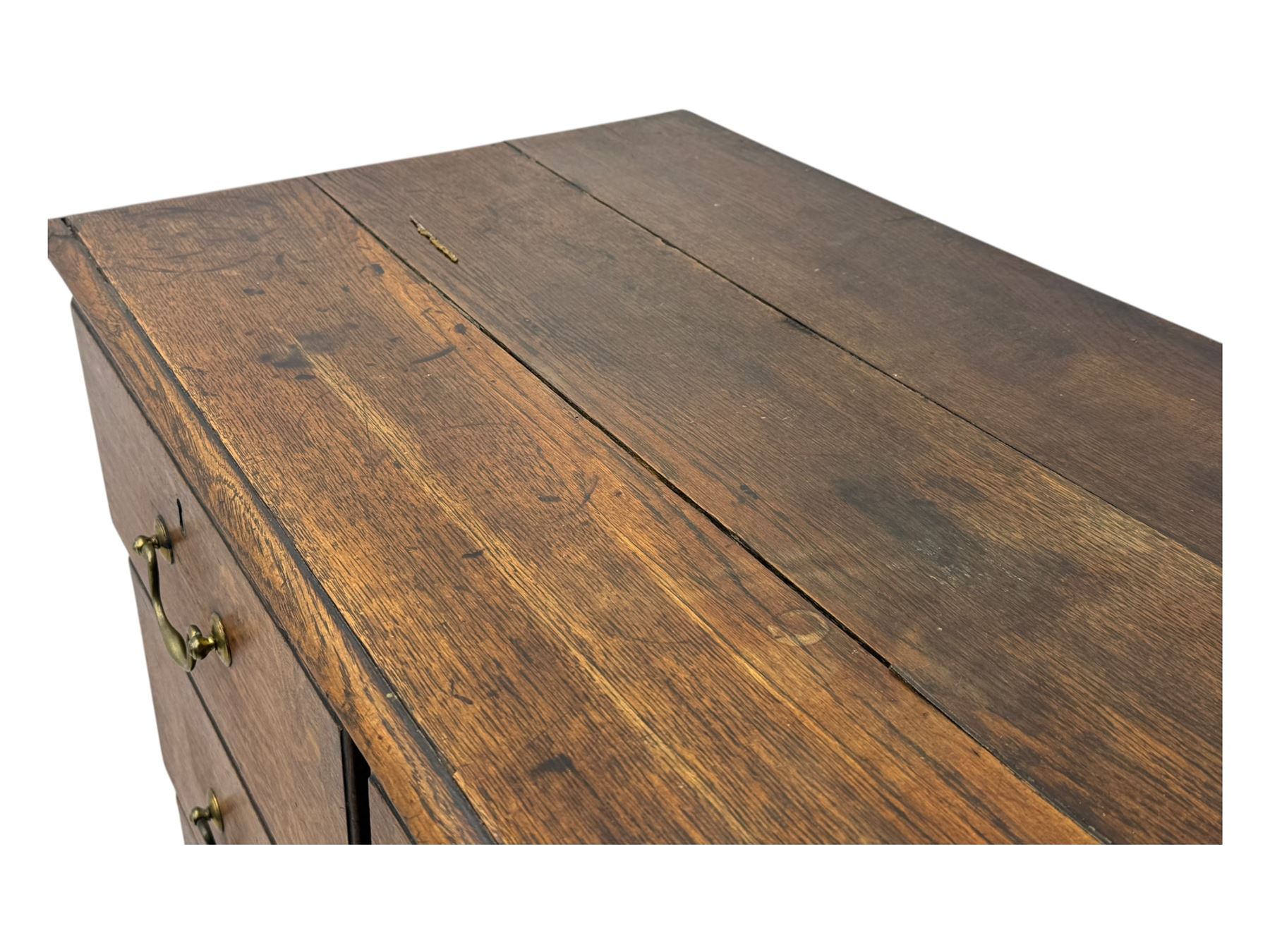 19th century oak chest, rectangular top over two short and three long drawers, on bracket feet