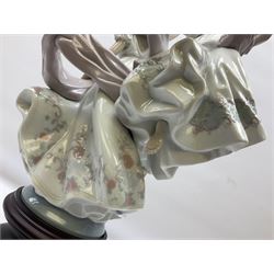 Large Lladro figure, Allegory of Liberty, modelled as two ladies dancing on a mahogany base, with original box, no 5819, year issued 1991, H63cm 