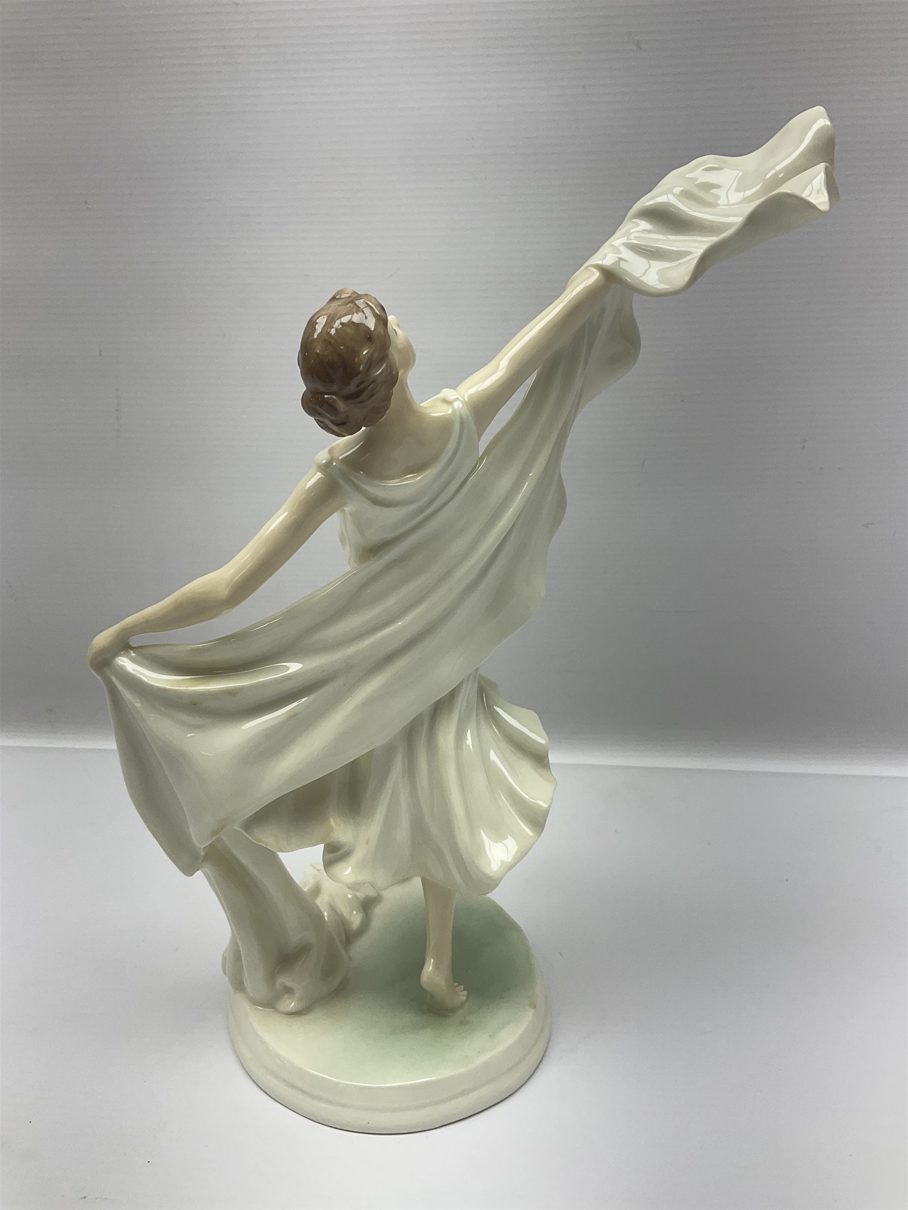 Two Royal Worcester figures, comprising Spirit of the Millennium and Spring, together with Royal Dux figure of two lovers