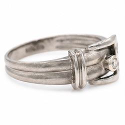 14ct white gold three stone diamond buckle ring, bezel and rubover set with three round brilliant cut diamonds, to a brushed and polished gold band, stamped 585