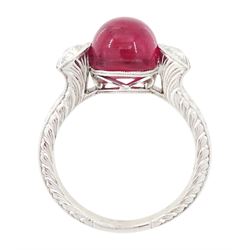 18ct white gold pink tourmaline and diamond ring, single oval cabochon cut tourmaline of approx 4.75 carat, set with a half moon cut diamond either side, to engraved laurel leaf design shoulders