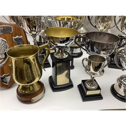 Collection of silver plated and metal trophy cups and winners plaques, all relating to the Burniston and District Show, most engraved with competitions and winner's names, in three boxes 