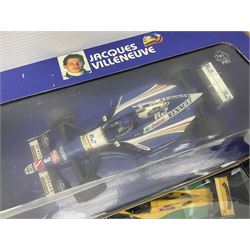 Four Paul's Model Art 1:18 scale die-cast racing cars - Jacques Villeneuve Williams Mecachrome Launch Version 1998 and Williams Renault FW19; Ralf Schumacher Jordan Peugeot 197; and Michael Schumacher Benetton Renault B195 World Champion 1995; all boxed (4)