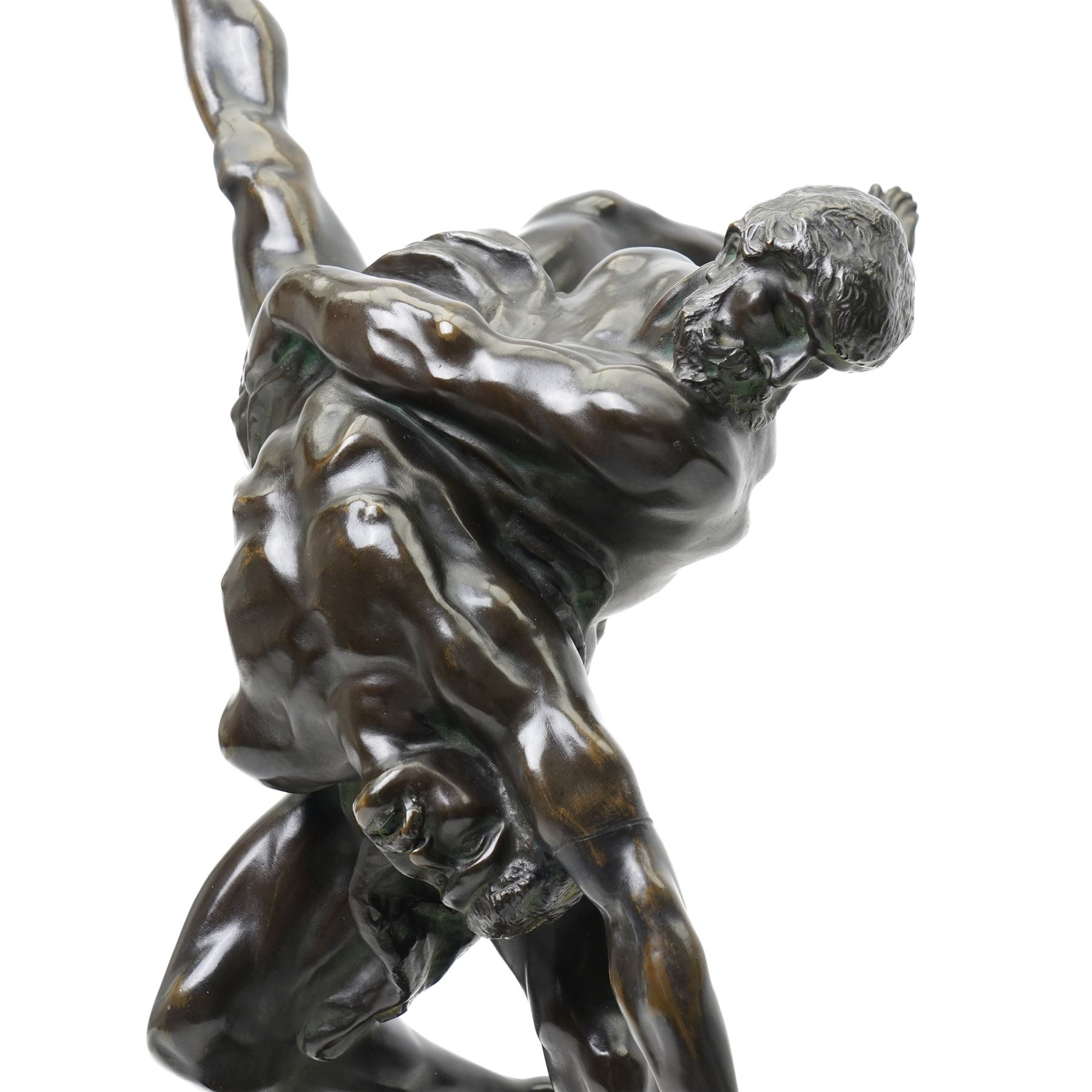 After Jef Lambeaux (Belgian 1852-1908): 'The Wrestlers' (Les Lutteurs), early 20th-century bronze group depicting two Hellenic classically nude male figures engaged in a violent athletic struggle or pankration event, on a naturalistic base signed, H63cm
Notes: the composition may plausibly be interpreted as Hercules and Antaeus, the mythological combat in which Hercules overcomes Antaeus by lifting him from the earth, thereby depriving him of his strength
