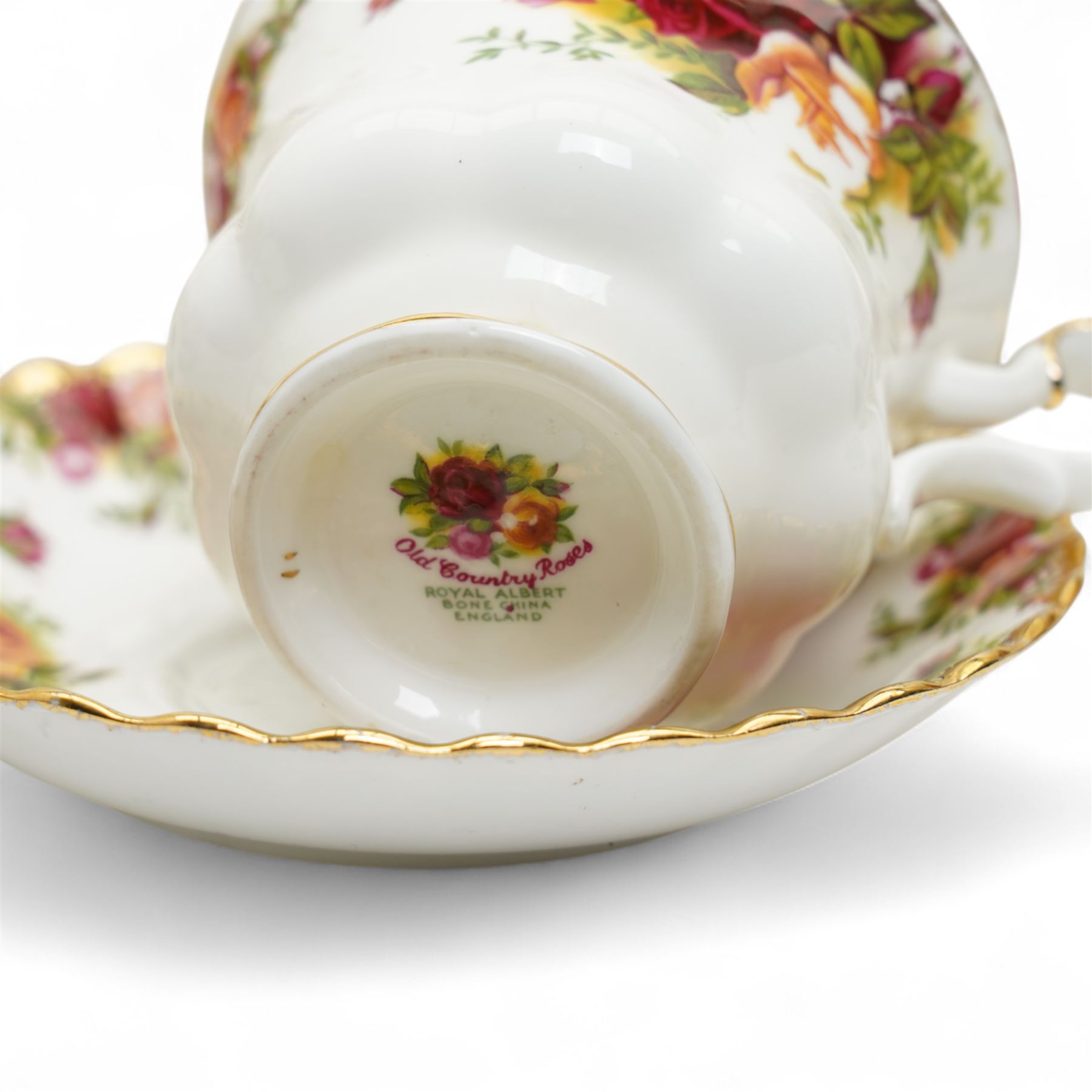 Royal Albert Old Country Roses tea and dinner service comprising four dinner plates, four dessert plates, four soup bowls, six cups, seven saucers, twelve side plates, tea pot, supper plate with mug and saucer dish