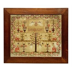 Victorian sampler, by Hannah Longster, Aged 11 years, dated 1847, worked with the Tree of Life, Adam and Eve, and various motifs including urns of flowers, lions, deer, and cherubs, within a stylised foliate border, in mahogany frame,  H49cm L56cm