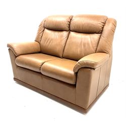 G-plan two seat sofa, upholstered in tan leather