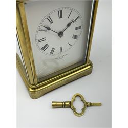 Early 20th century brass carriage clock with repeater, white enamel dial signed ‘Wilkinson, Paris’, twin train movement striking the hours and half on coil, with button repeater 