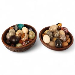 Collection of hardstone and other specimen eggs, including serpentine, fossilised coral, a...