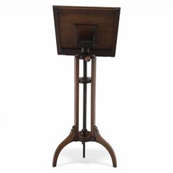 Edwardian inlaid adjustable music stand, with central shelf motif, folding sheet music holder, raised on an adjustable column above three splayed supports 