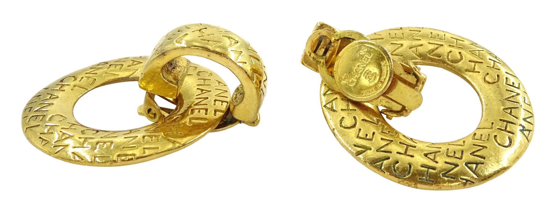 Chanel pair of gilt two in one clip-on earrings, with engraved 'Chanel' removable hoops, circa 1980's