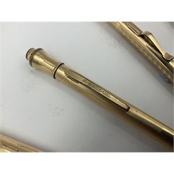 Five gold filled Wahl Eversharp propelling pencils, together with a silver propelling pencil, hallmarked London 1946, J.M.Co Johnson, Matthey & Co, and two further gold filled propelling pencils, one with box, largest L13cm (8)