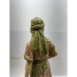 Royal Dux figure no. 686, modelled as a female water carrier, carrying two urns and wearing flowing green and pink robes, with applied pink triangle mark beneath, H61cm