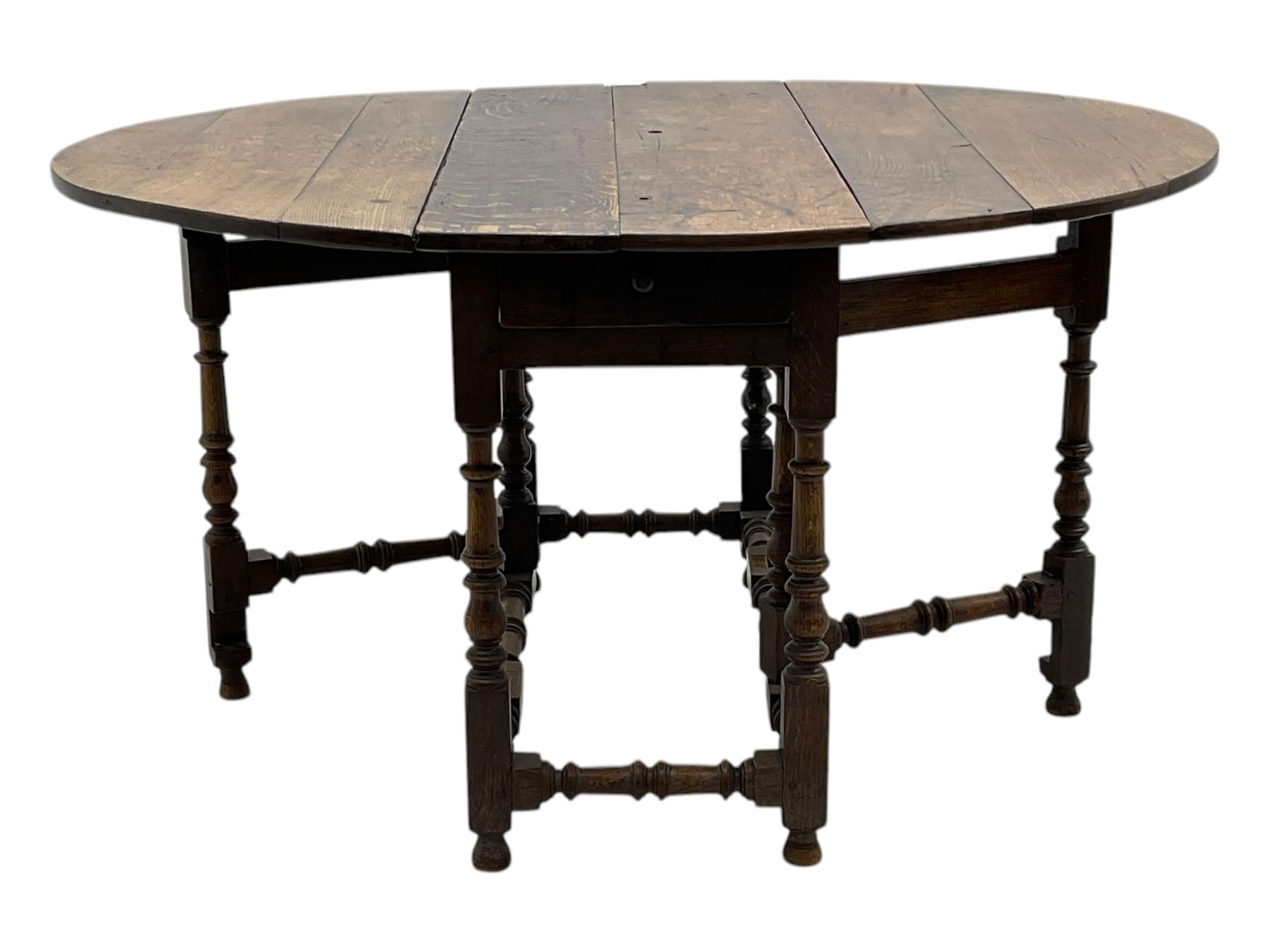 18th century oak drop leaf table, oval top with two drop leaves and frieze drawer, raised on turned supports with turned stretchers