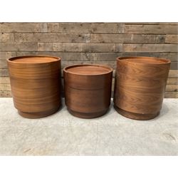 Three walnut circular barrel shaped lamp tables, fitted with single drawer (lower table D53cm, H49cm)