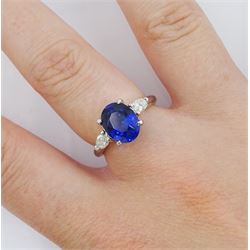 Platinum three stone oval cut sapphire and pear cut diamond ring, hallmarked, sapphire approx 2.70 carat