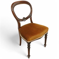 A pair of Victorian walnut balloon back parlours chairs, with carved top rail and back splat with cabriole style legs, Together with a pair Victorian mahogany balloon dining chairs