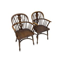 Pair late 20th century oak Windsor elbow chairs, double hoop and stick back with pierced and fretwork work splat, dished seat on turned supports joined by crinoline stretcher 