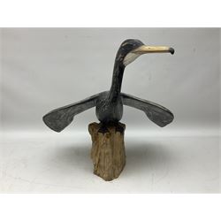 Wooden sculpture of Cormorant aquatic bird on a naturalistic wooden plinth, H46cm