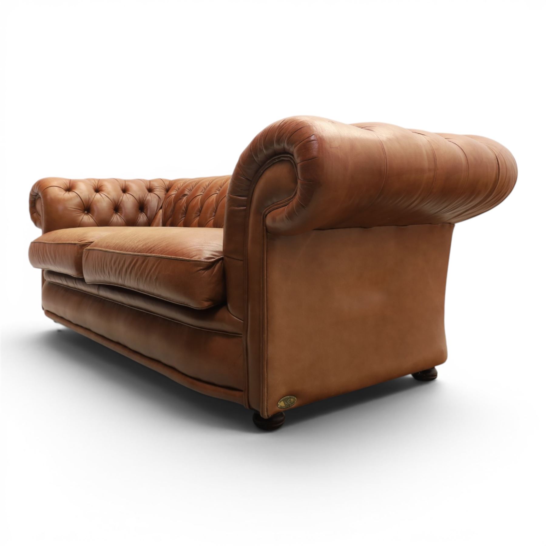 Springvale - Large three seat Chesterfield sofa, upholstered in buttoned tan leather, two cushion deep seat, turned bun feet