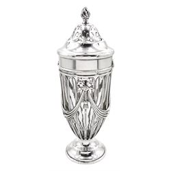 Early 20th century silver sugar caster, of open work urn form with ribbon swag detail and clear glass liner, the removable pierced cover with flambeau finial, upon a circular spreading foot, hallmarked Haseler Brothers, London 1910, H17.5cm, approximate silver weight 5.56 ozt (173 grams)