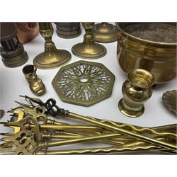 Collection of brassware, to include two jardinieres, candle sticks, brass shell, etc