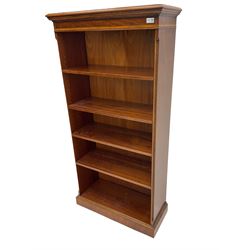 Georgian design mahogany open bookcase, fitted with four adjustable shelves, crossbanded detail