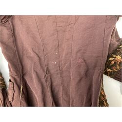 Victorian ladies riding habit, the two-piece construction in brown with embroidered floral velvet edging