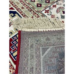 Bakhtiari design rug, the field divided into panels each decorated with tree of life and floral motifs, the main border decorated with Hac motifs 
