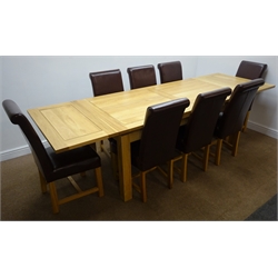  Light oak extending dining table, square supports (W280cm, H79cm, D90cm) and eight high back chairs, upholstered in a leatherette fabric (W50cm)  