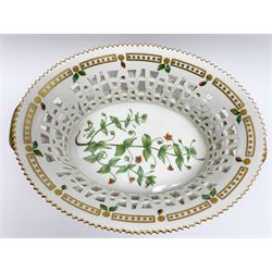 Royal Copenhagen Flora Danica basket, with naturalistically modelled vine handles and reticulated sides detailed with polychrome forget-me-nots, the interior decorated with a botanical study of 'Anagallis arvensis', sprigs and a gilt border, with printed and painted marks beneath, H8cm L26cm 

