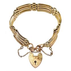 Early 20th century 9ct gold four bar gate bracelet with heart padlock clasp, engraved with initials 'E.J.A.M' verso, stamped 9ct 