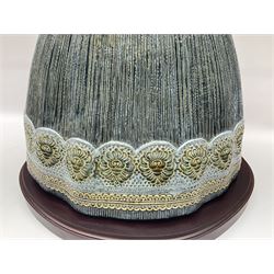 Large Lladro figure, La Menina, modelled as a maid of honor in service, on a mahogany oval base, limited edition 99/1000, sculpted by Jose Puche, with certificate of authenticity, framed and glazed, no 1812, year issued 1996, year retired 2019, H60cm