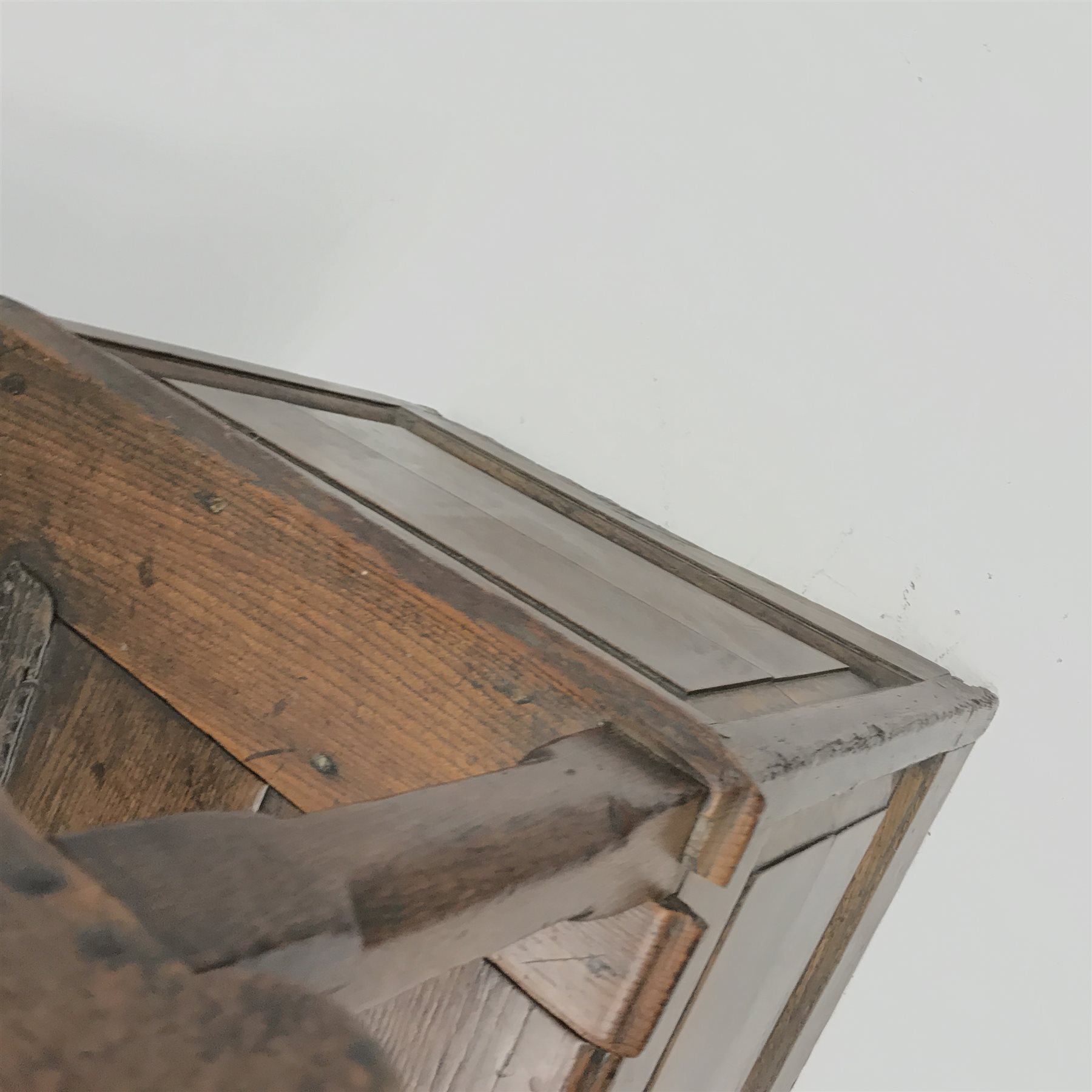 18th century oak box seat settle, panelled back, cresting rail initialled 'T.I', the moulded seat with hinged lid, down swept arms on octagonal faceted supports, fielded panelled base, engraved brass escutcheon initialled again 'T.I', W80cm, H149cm, D59cm